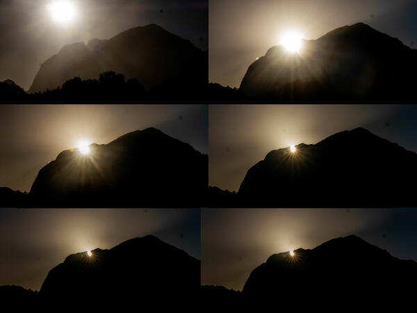 En Benidorm, el sol atraviesa el Portell del Puig Campana en el anuncio de la noche más corta